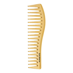 Golden Styling Comb on white background