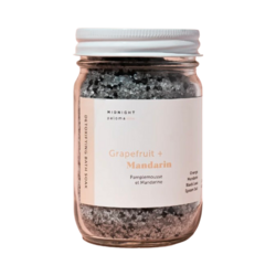 Grapefruit + Mandarin Detoxifying Bath Soak on white background