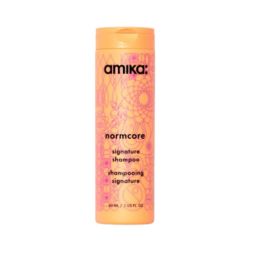Amika Normcore Signature Shampoo on white background
